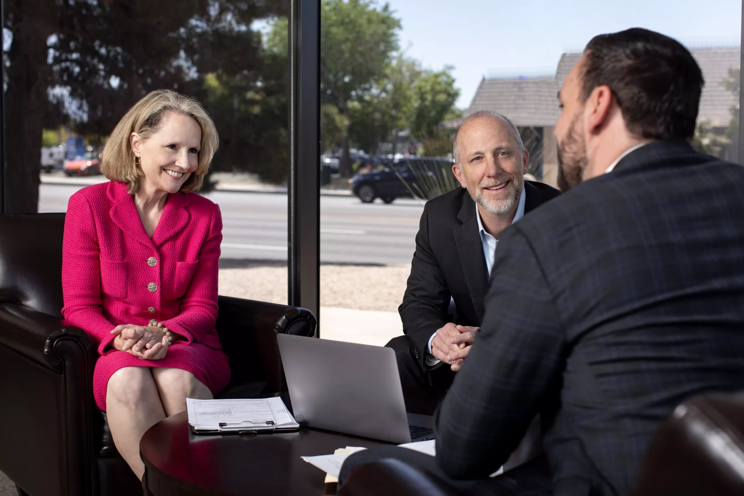 PARRIS attorneys in discussion, representing the firm's review process and case strategy.